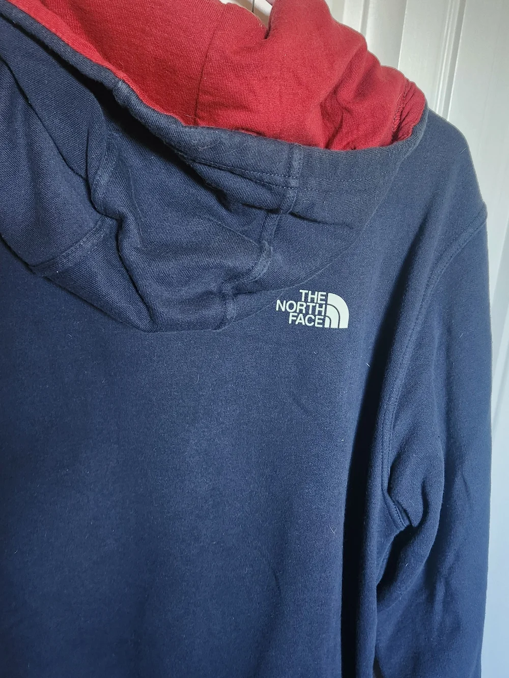 The North Face Navy Pullover Hoodie with Red Lined Hood
